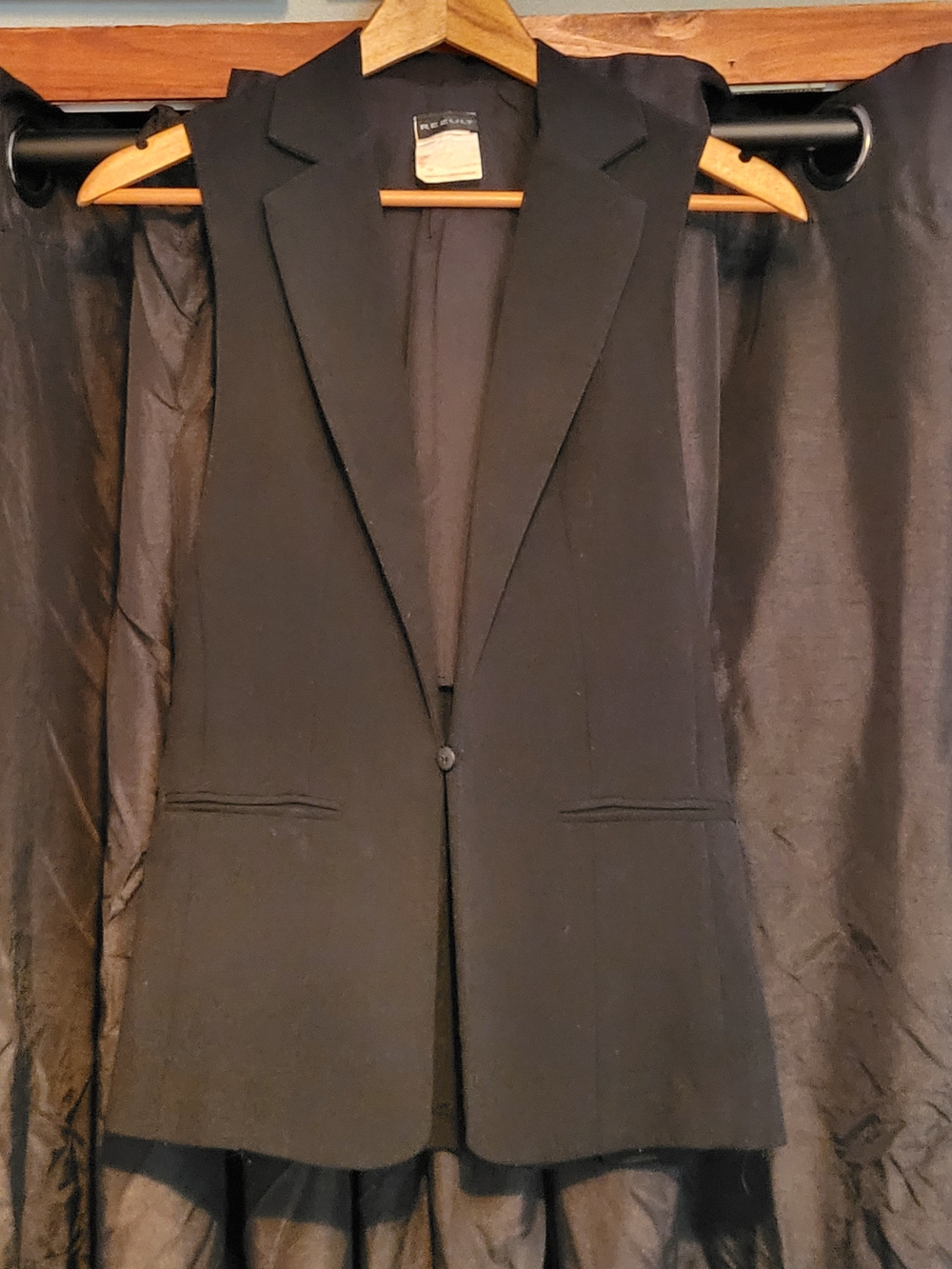 Women’s Black Vest with Streamlined Pocket Detail